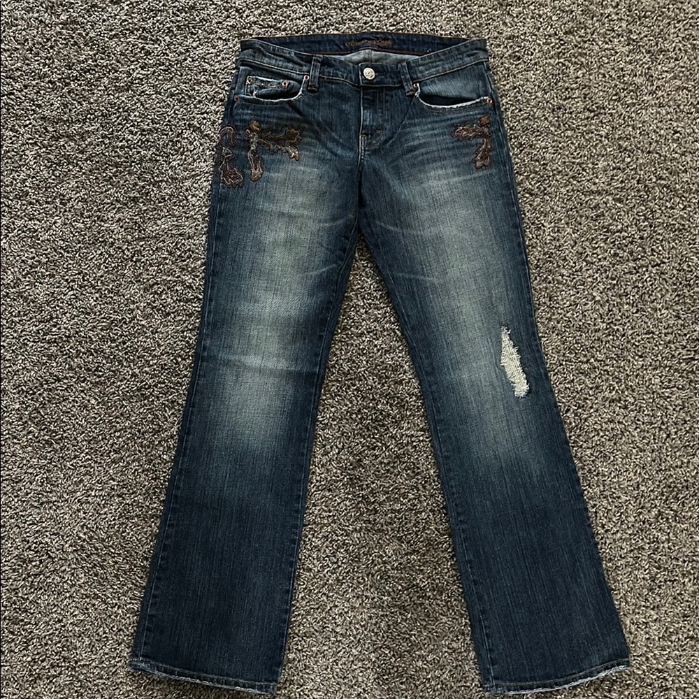 Women's Distressed Blue Jeans